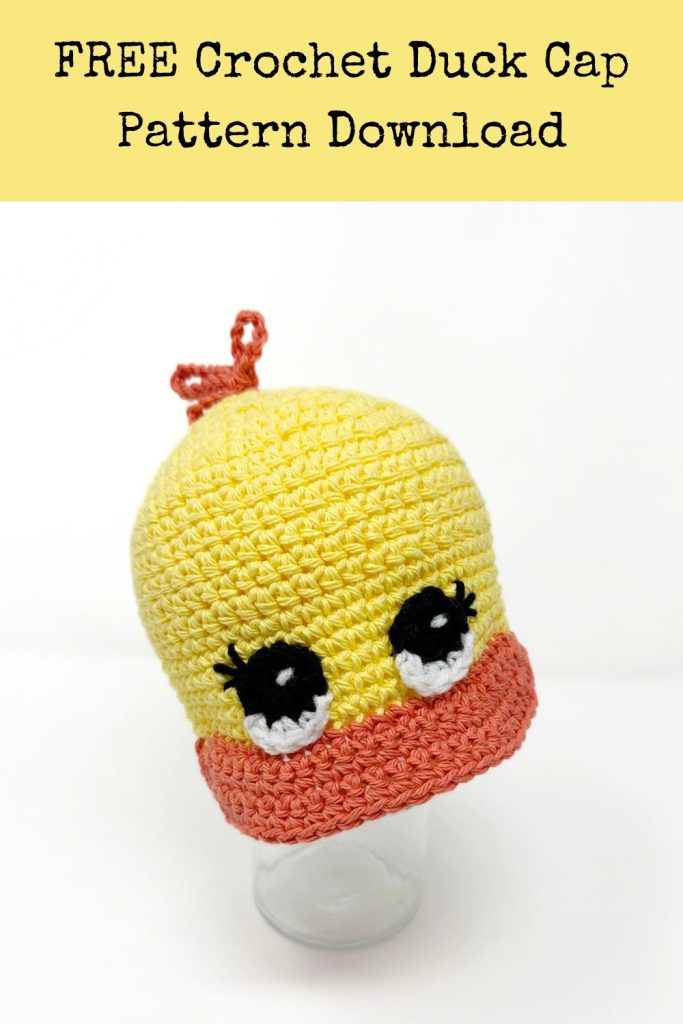 yellow and orange crochet duck cap with big eyes