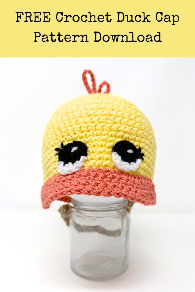 yellow and orange crochet duck cap with big eyes