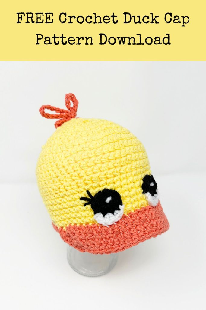 yellow and orange crochet duck cap with big eyes