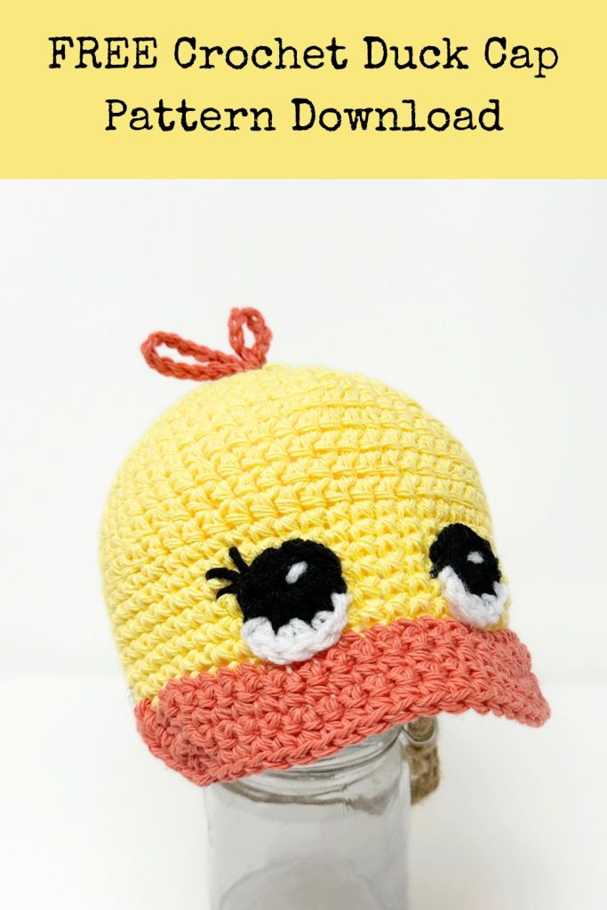 yellow and orange crochet duck cap with big eyes