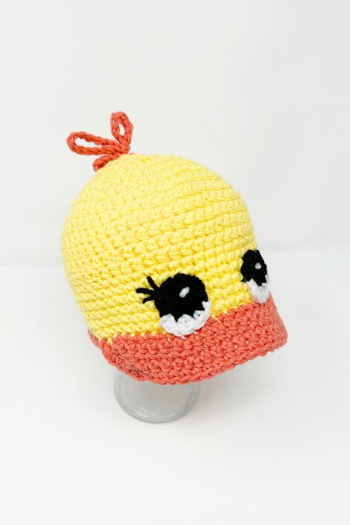 yellow and orange crochet duck cap with big eyes