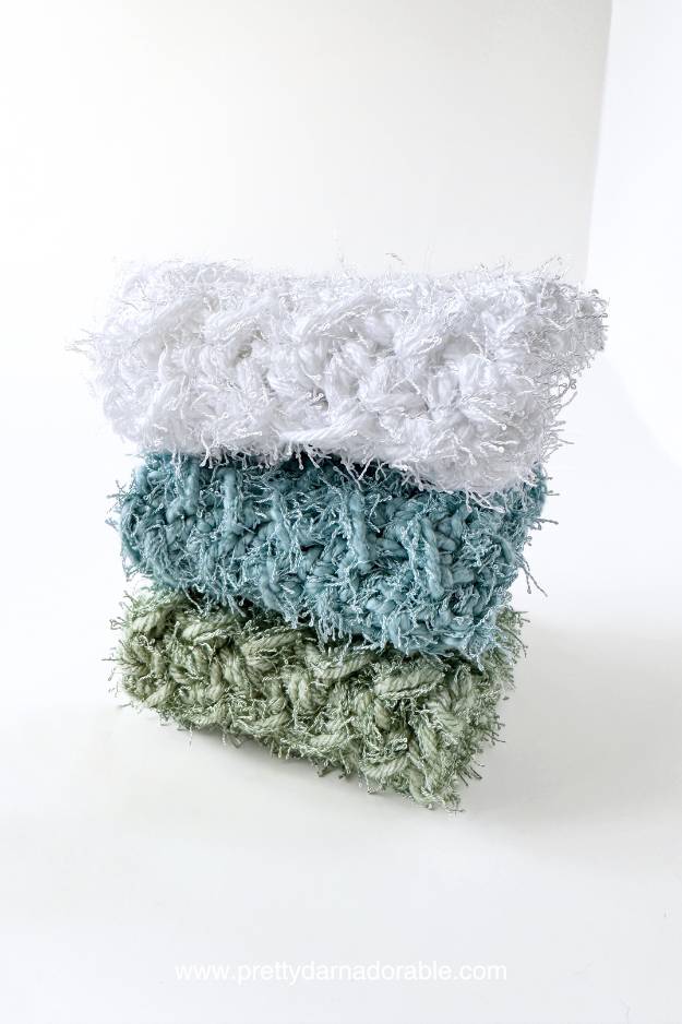 green and blue thick dishcloths made with scrubby yarn
