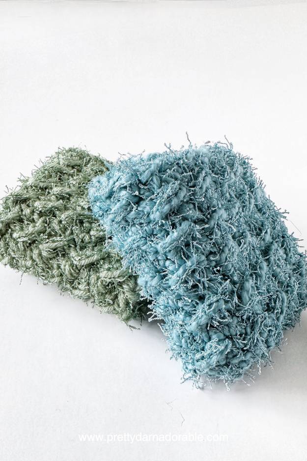 green and blue thick dishcloths made with scrubby yarn