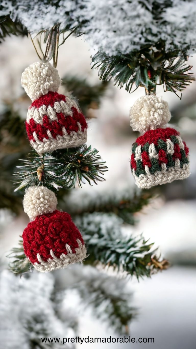 red and white mini hat christmas ornaments hanging on a tree
