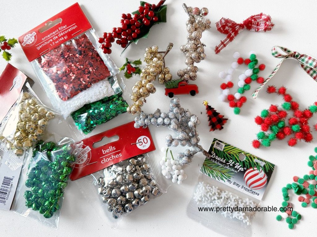 photo of ribbon, pompoms bells and buttons for crochet wreath emebelishements