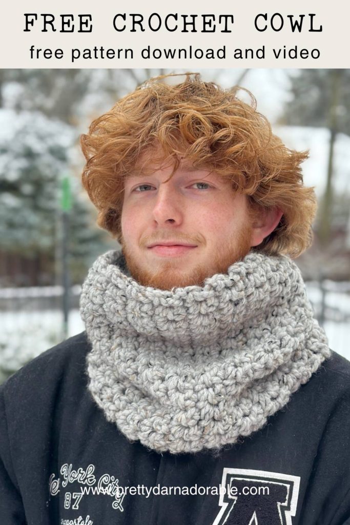 man wearing a super bulky crochet cowl