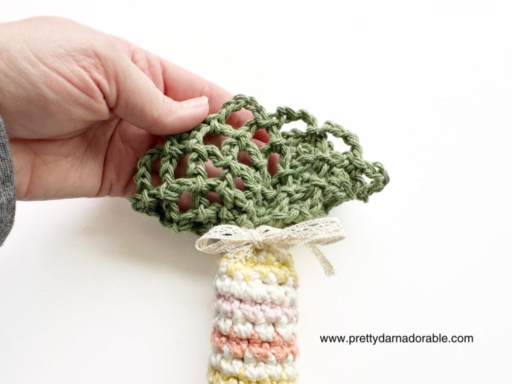 green lacey crochet top of a carrot
