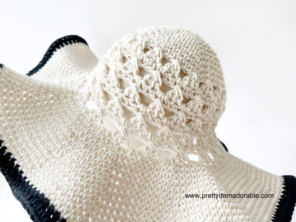crochet ladies sun hat in cream cotton with wide brim with black trim
