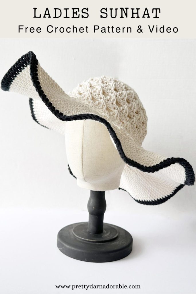 crochet ladies sun hat in cream cotton with wide brim with black trim