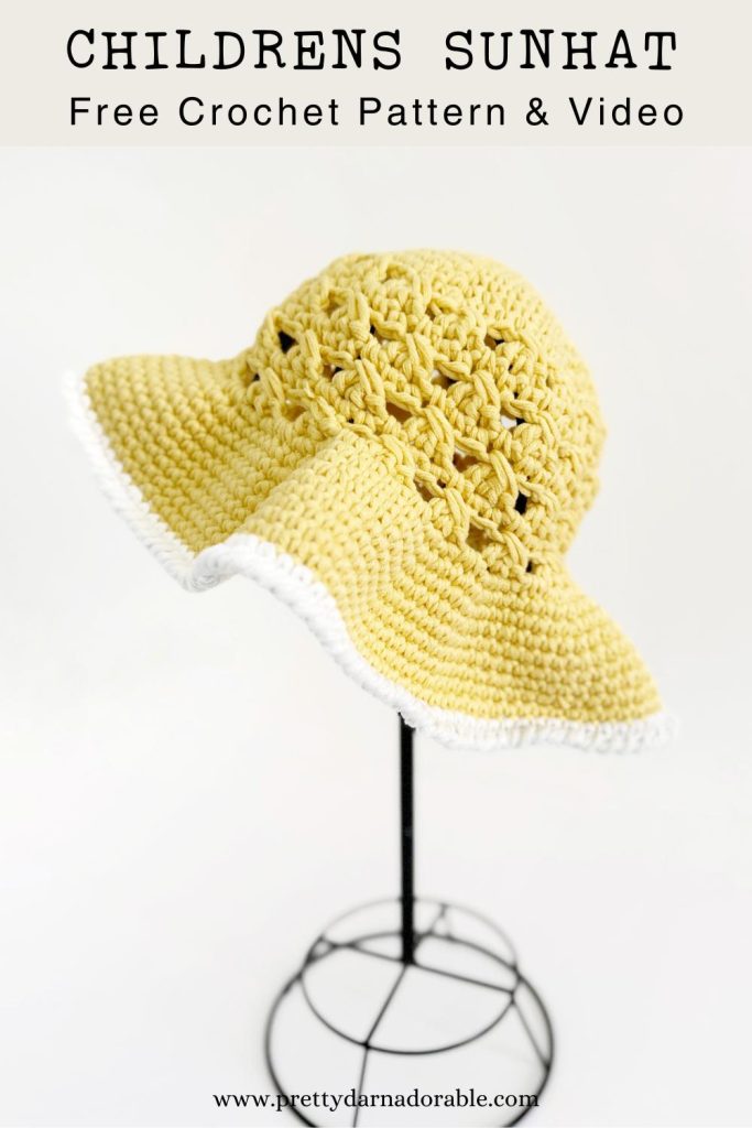 childs crochet sun hat made in yellow cotton with cream trim