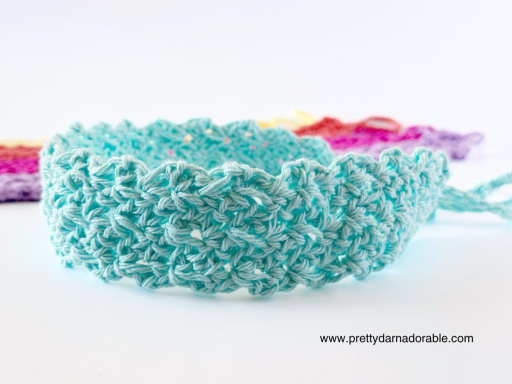 Aqua colour lace texture crochet headband with tie at the back