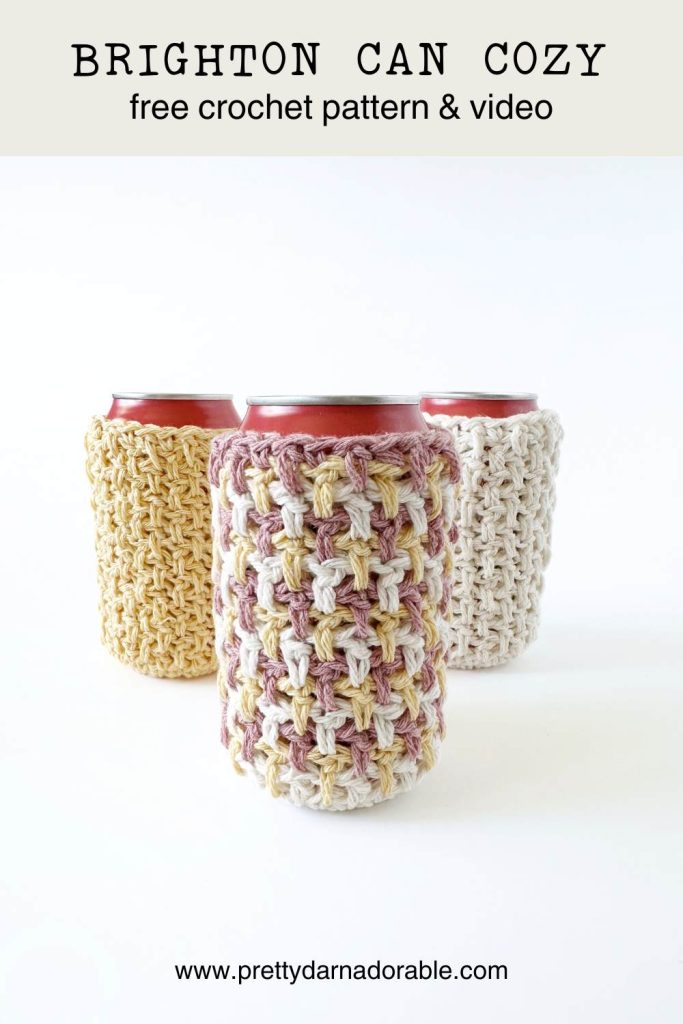 three crochet can cozies in pastel colours