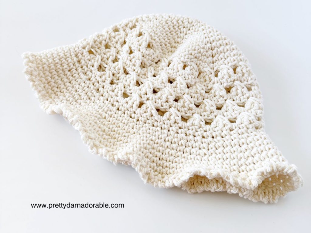 cream crochet granny stitch bucket hat with ruffly edge