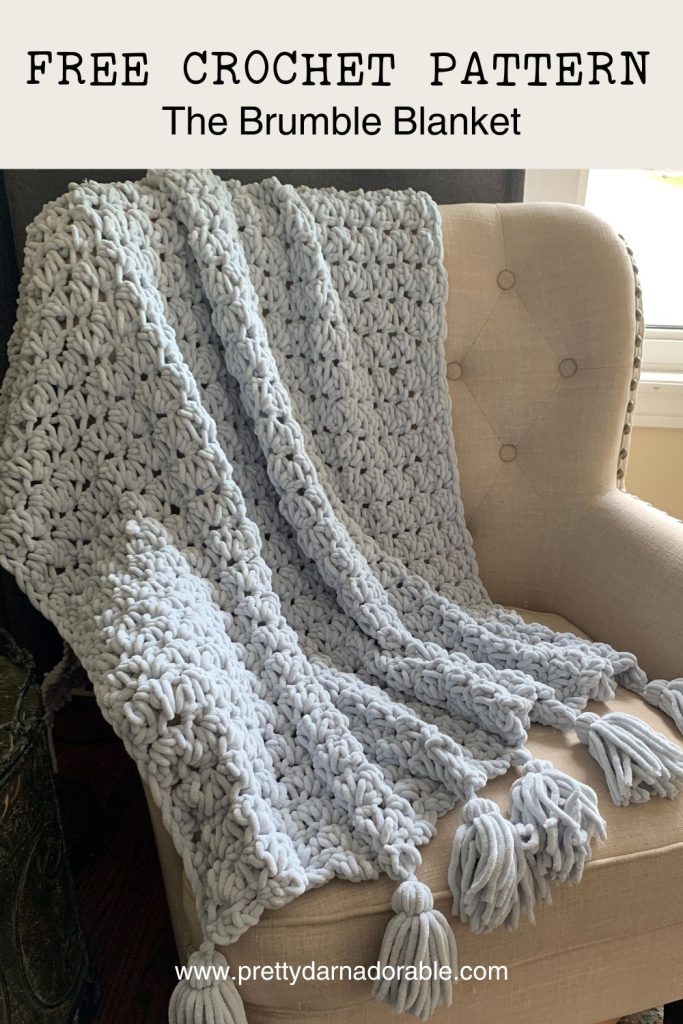 grey crochet chunky blanket with tassels