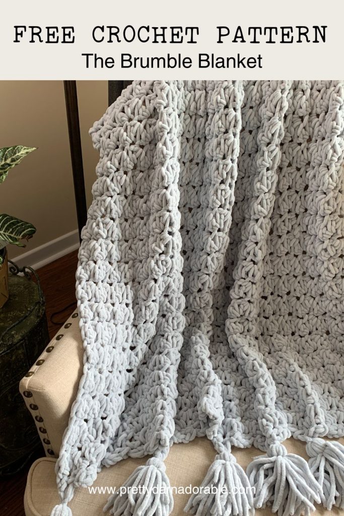grey crochet chunky blanket with tassels