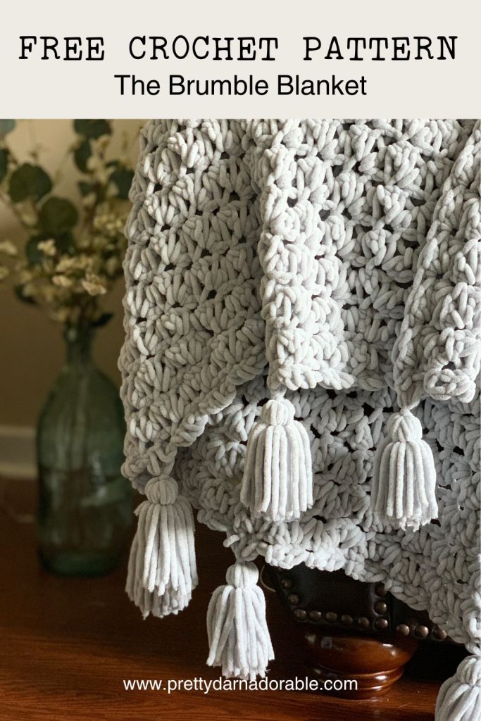 grey crochet chunky blanket with tassels