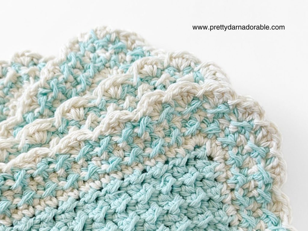 close up of crochet contrast border made of crochet crunch stitch on crochet dishcloth