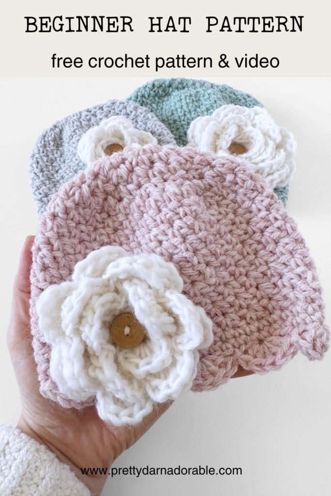 Pink, crochet hat with scalloped edging with crochet rose. free crochet beanie hat pattern