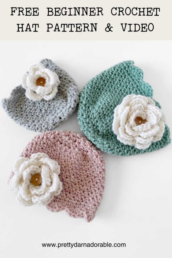 Pink, aqua and grey crochet hat with scalloped edging with crochet rose
