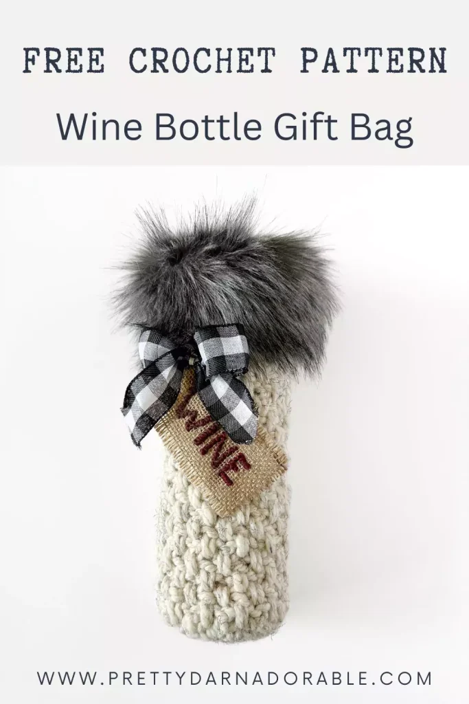 a bottle of wine and a crocheted wine bottle gift bag with faux fur fabric trim, checkered bow and wine tag
