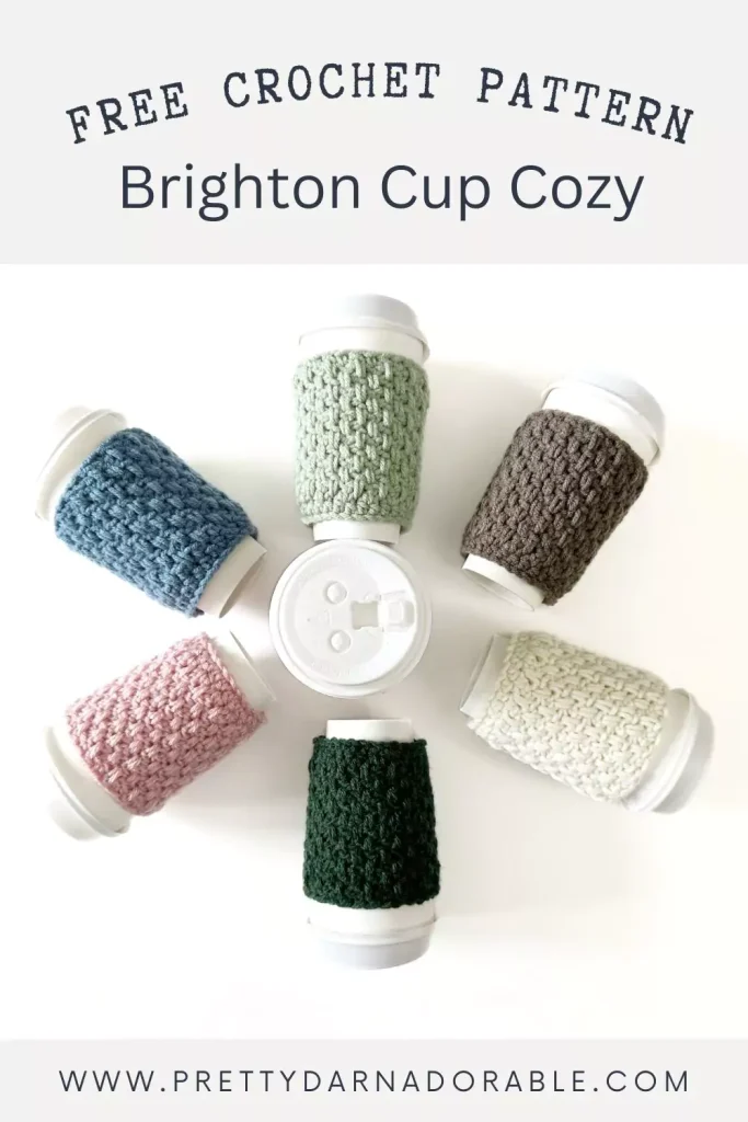 a group of crochet coffee cozies in soft pastel colours