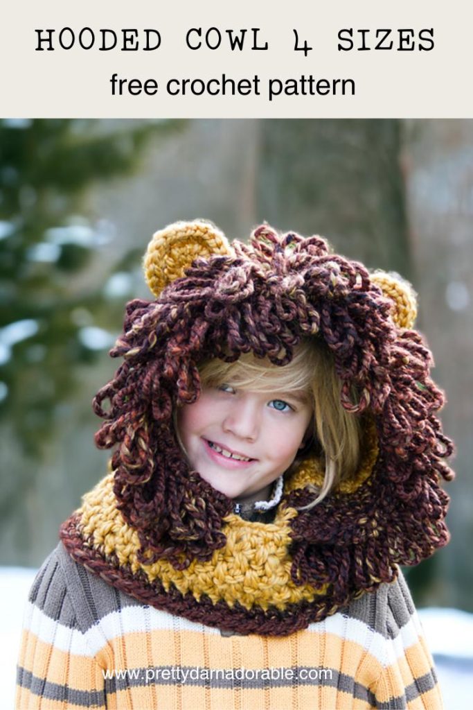 child wearing lion crochet hooded cowl