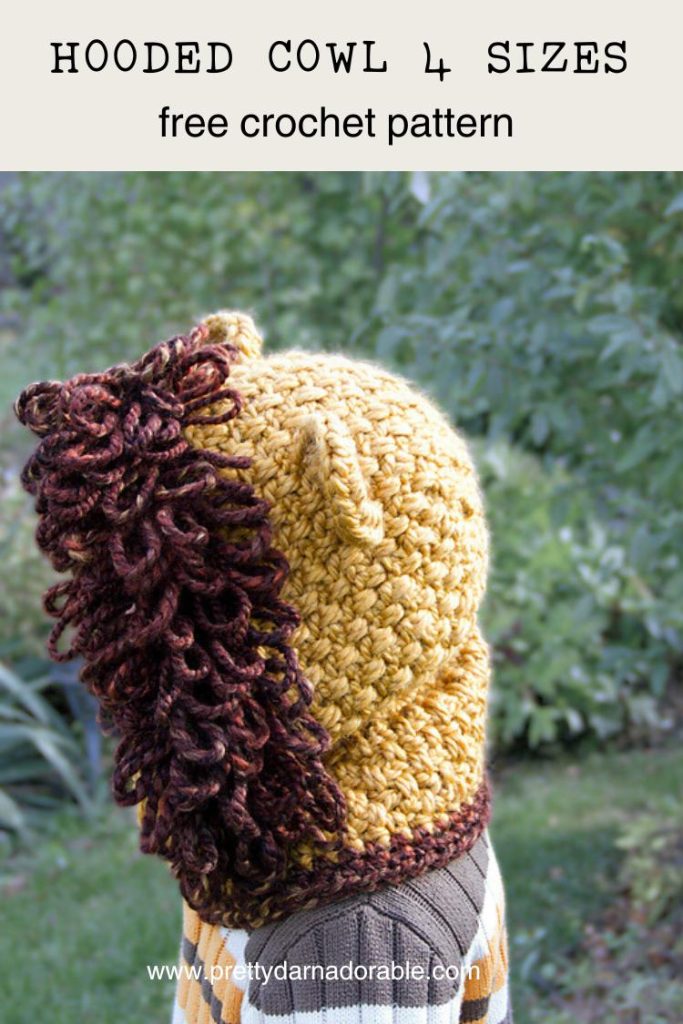 child wearing lion crochet hooded cowl