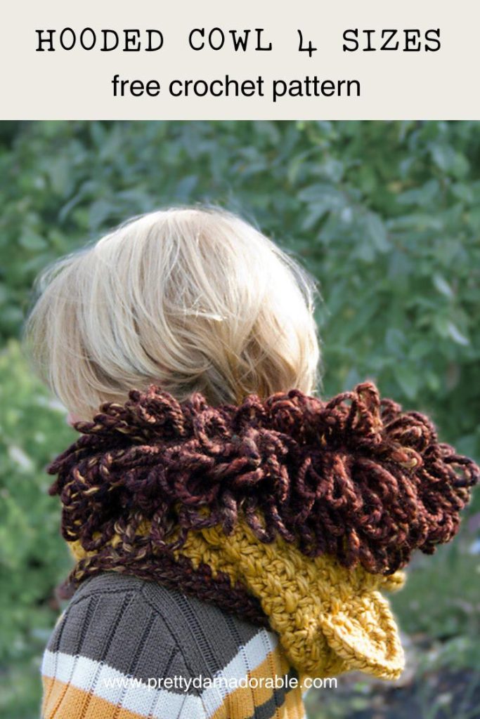 child wearing lion crochet hooded cowl