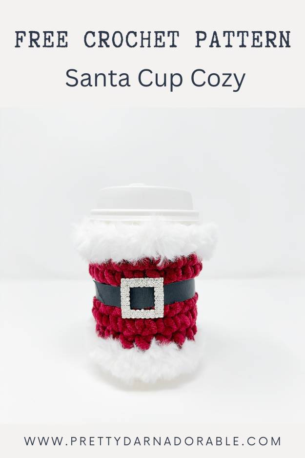 red crochet cup cozy with fur trim rhinestone buckle and black belt - looks like santa