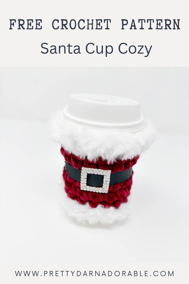 red crochet cup cozy with fur trim rhinestone buckle and black belt - looks like santa