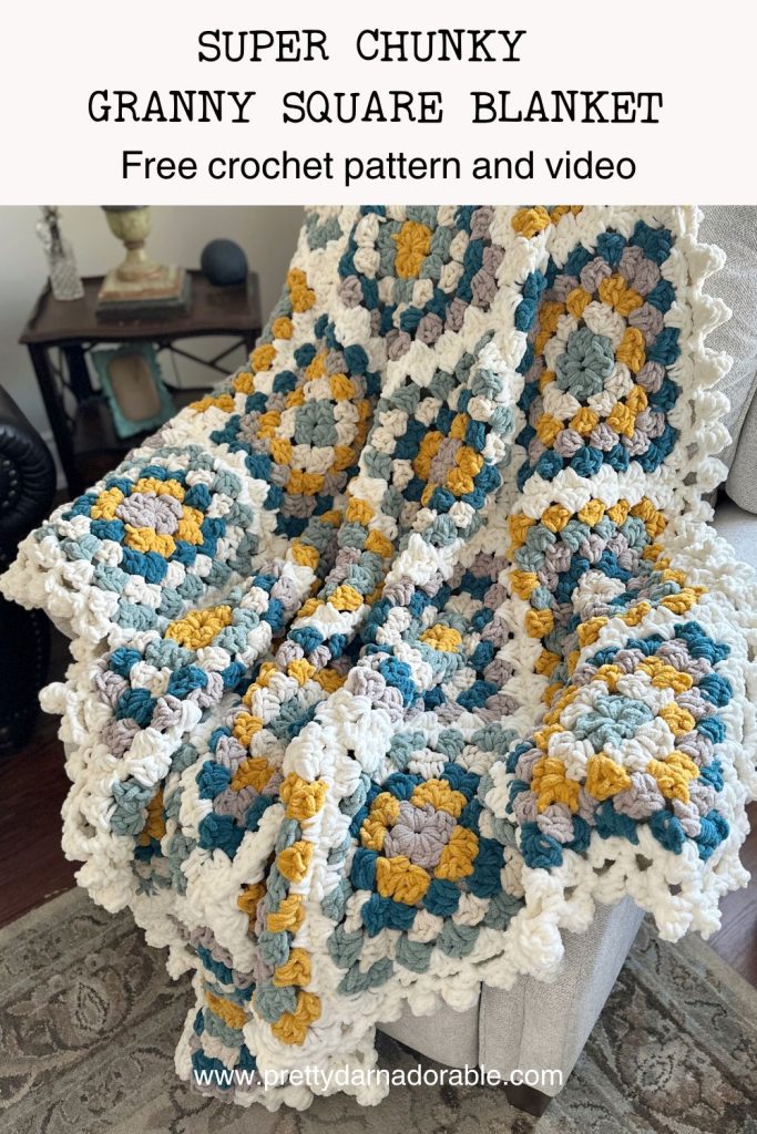 chunky granny square blanket with bobble edging on chair
