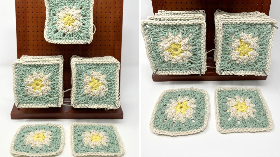 Crocheted granny squares with yellow, white, and green floral patterns are displayed on a wooden stand and laid flat, perfect for kitchen decor or inspiring your next project with this beautiful crochet placement.