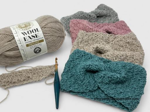 Beige wool yarn, a blue crochet hook, and a half-made strip sit beside four textured headbands in gray, pink, beige, and teal. Free crochet pattern