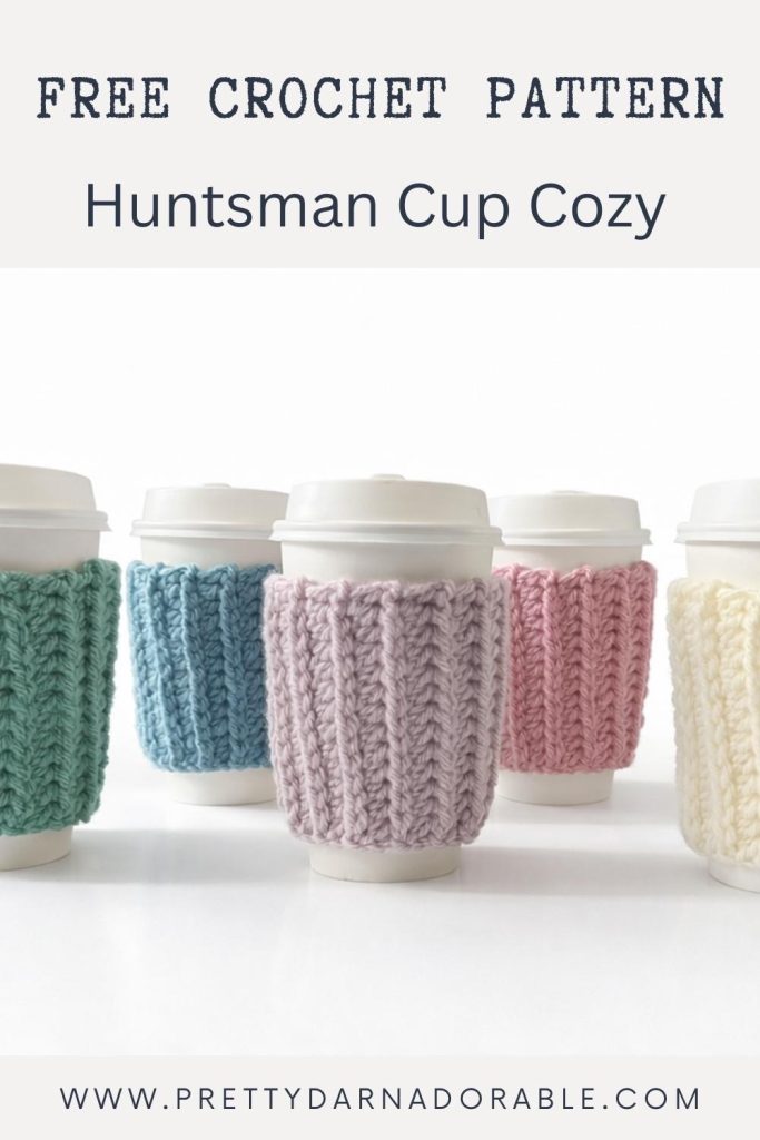 Four lidded coffee cups with chunky crochet cozies in green, blue, lavender, pink, and cream. Text: Free Crochet Pattern Huntsman Cup Cozy. Free crochet pattern