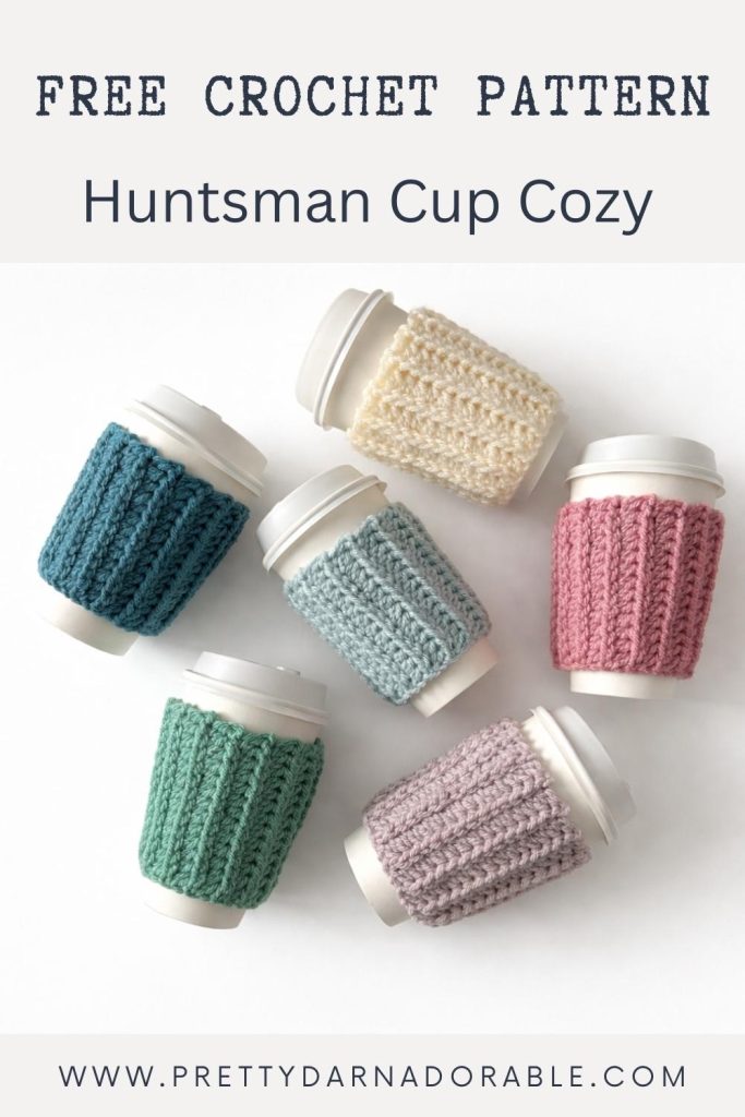 Six cups with pastel crochet cozies on a white background; text reads “Free Crochet Pattern Huntsman Cup Cozy” and “PRETTYDARNADORABLE.COM.”. Free crochet pattern