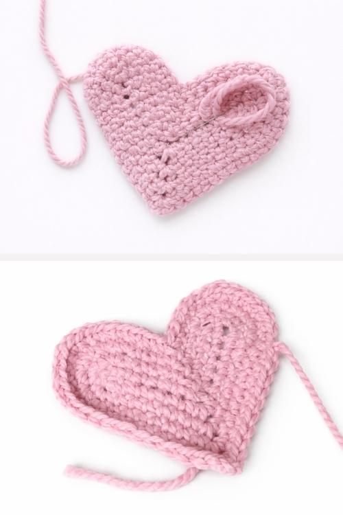 Two images show a pink crocheted heart: one in progress with a loose yarn loop, and one finished, flat with the yarn tail visible. Free crochet pattern