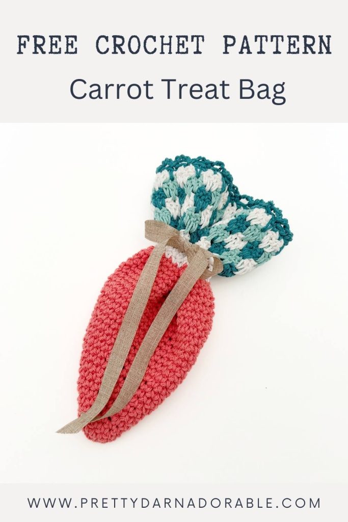 Crocheted carrot-shaped treat bag, red-orange with green-and-white top and beige ribbon, plus text: Free Crochet Carrot Treat Bag Pattern. www.prettydarnadorable.com. Free crochet pattern