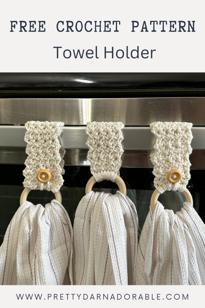 Three crocheted towel holders with wooden rings hang on an oven, each holding a striped towel. Text: Free Crochet Pattern Towel Holder, www.prettydarnadorable.com. Free crochet pattern
